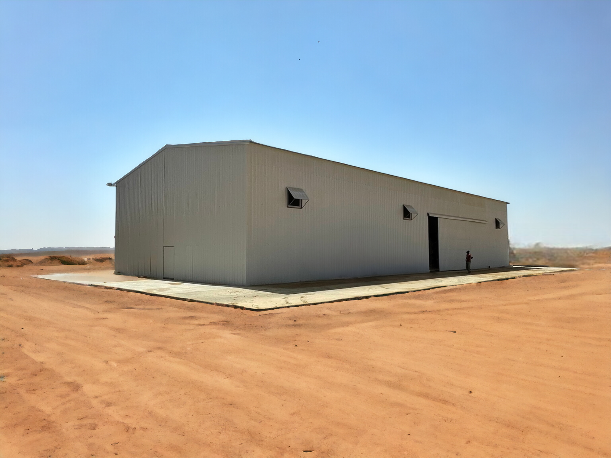 Bâtiment galvanisé 865m² avec porte coulissante