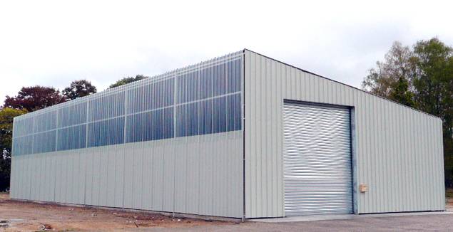 Single slope photovoltaic industrial building in kit shape