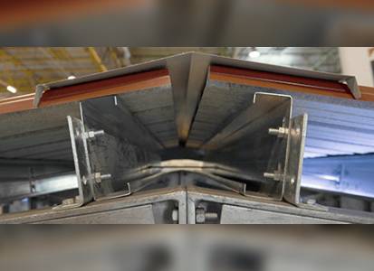 Faîtière fixée sur la panne